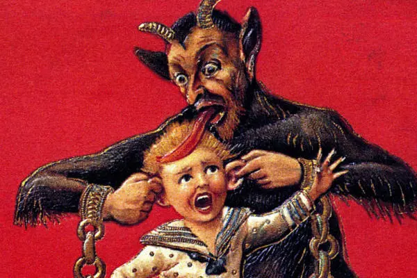 immagine del Krampus mentre mangia un bambino